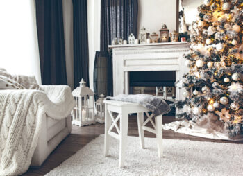 White Christmas interior with christmas tree and scandi christmas decorations