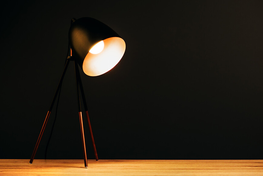 Modern black table lamp with wooden legs