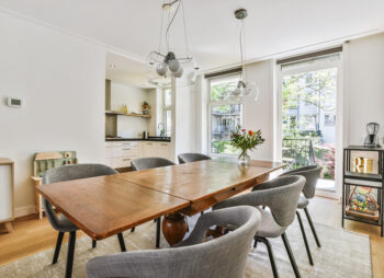 Contempory kitchen diner with solid wood dining table and mid centry round back chairs