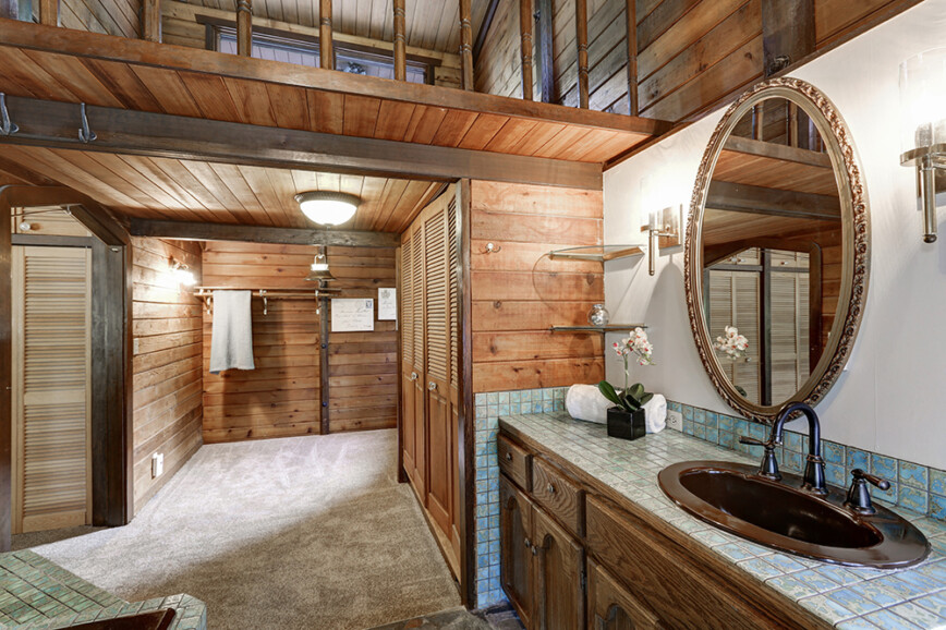 Interior including bathroom in a luxurious log cabin