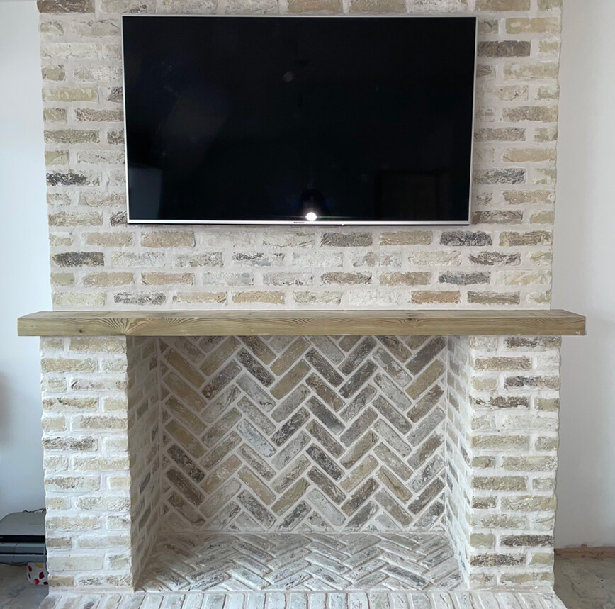 Full chimney breast covered in bick slips